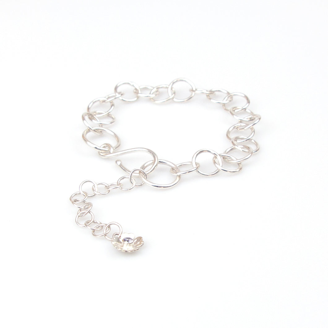 Sterling silver Forget-Me-Not flower bracelet with charm